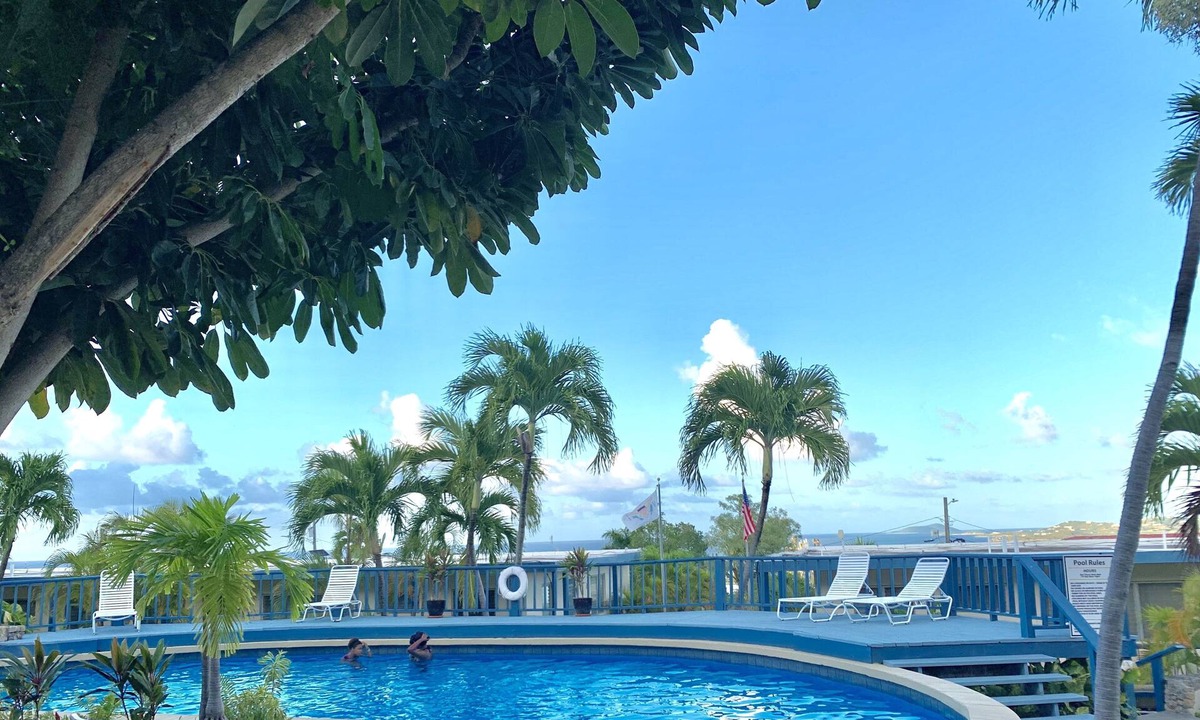 Orange Grove Condo | Caribbean views, w/ Pool and AC, in Christiansted. Minutes to the beach.