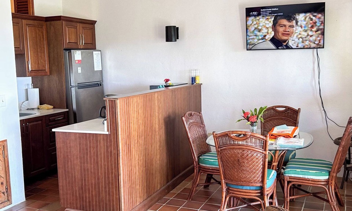 Estate Enighed Condo | Charming Corner Condo with A/C, Stunning Water Views, and Gorgeous Sunsets!