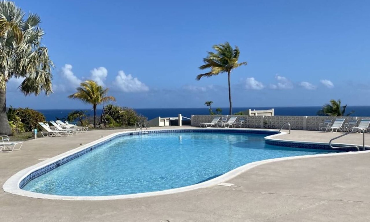 Estate Teague Bay Condo | Cozy condo w/ocean views & next to restaurants!