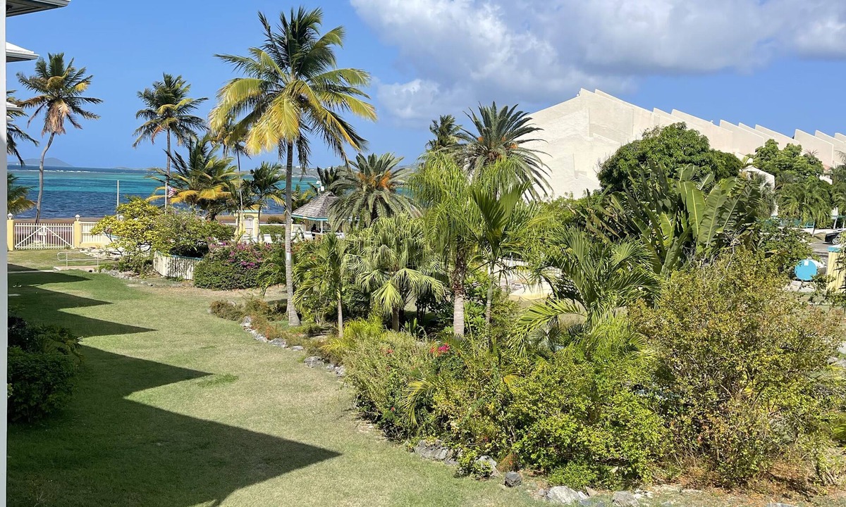 Estate Golden Rock Condo | Island Carribean Getaway! 1 King bed! 2BR/2BA Condo with beach access and pool!