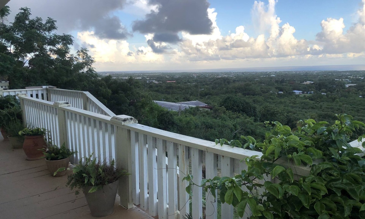 Estate Whim House | Large hillside one bedroom apartment with a sea view.
