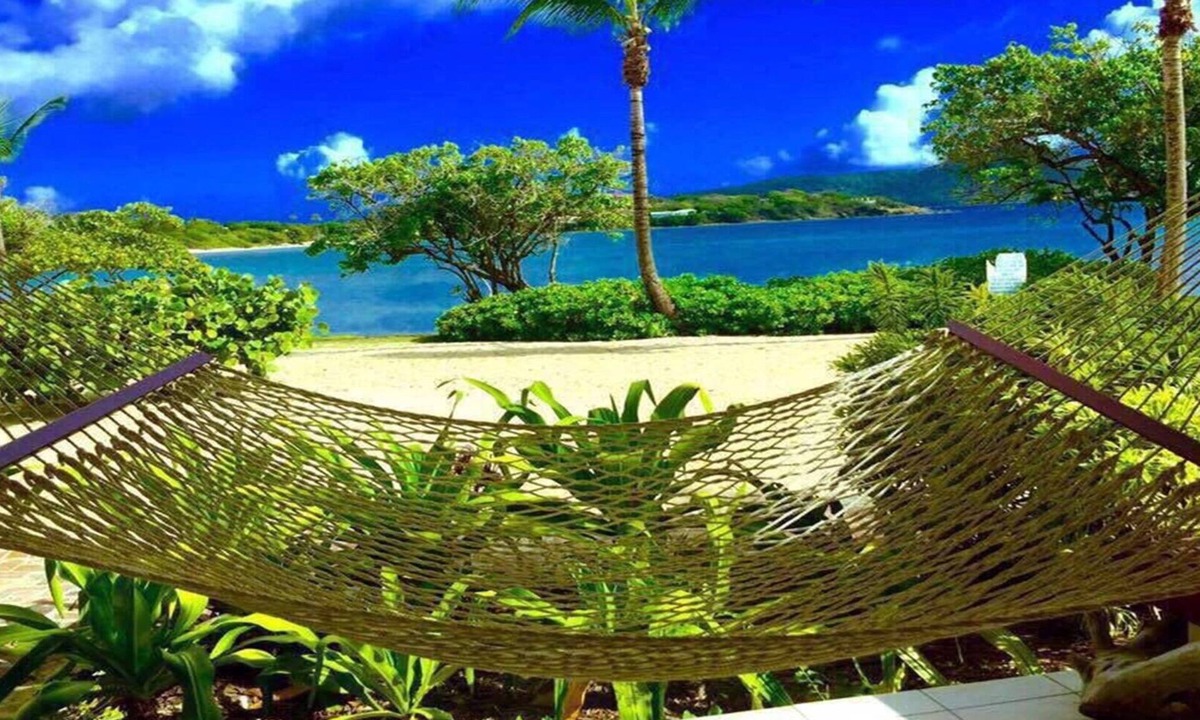 Red Hook Condo | Luxurious Beachfront Condo: May- August Savings! Paradise at your toes!