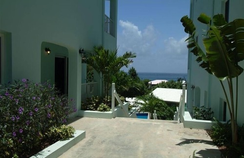 Estate Enighed Condo | Bougainvillea at Palm Terrace