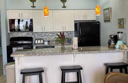 Estate Golden Rock Condo | Modern 1 bed 1 bath beachfront condo with breathtaking views 5 minutes from town