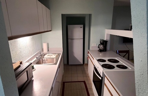 Christiansted Condo | St Croix Escape. Gated condo complex with pool, restaurant, bar and beach.
