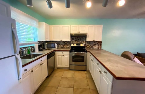 Nazareth Condo | 2BR Just steps away from the beach and pool and 5 min. drive to Red Hook!