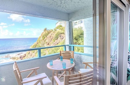 Bolongo Bay Condo | Amazing views! Spacious 2 BR,2 bath ocean front villa with 3 pools,2 restaurants