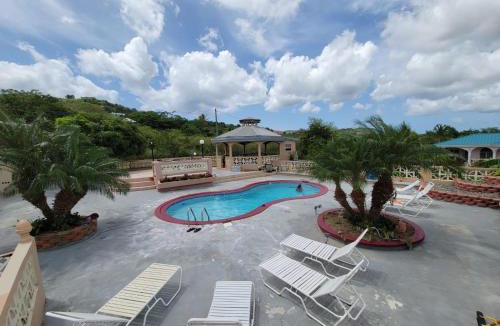 Grove Place Apartment | Apartment in Fredriksted With Pool -Tiffany's Place at The Green Castle