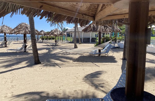 Estate Salt River Condo | Caribbean colors on wide open estate on a long sandy swimming beach.