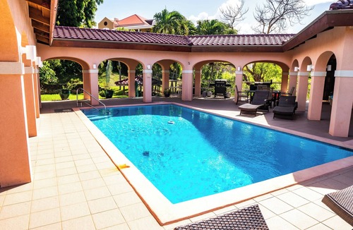Testman Villa | Castaway Dreams 20 person Villa with Boat, Pool, Tennis Court, and Sugar Mill