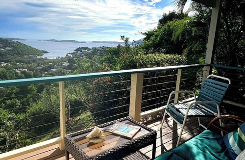 Estate Enighed Condo | Charming Corner Condo with A/C, Stunning Water Views, and Gorgeous Sunsets!