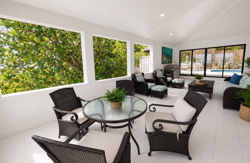 Estate Frenchman Bay House | Charming, Hillside Villa with Ocean & Beach Views