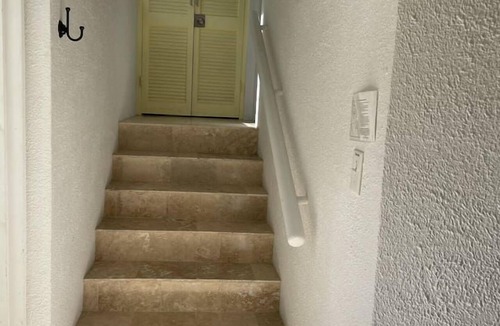Estate Teague Bay Condo | Cozy condo w/ocean views & next to restaurants!