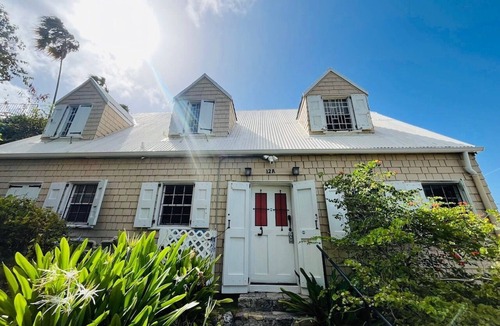Estate East Street House | Crucian Fusion: Historic charm meets lush beauty in a rare garden oasis in downtown Christiansted!