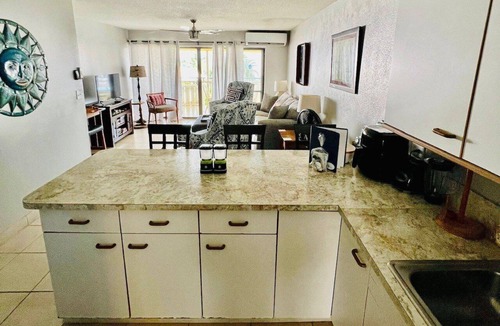 Estate Golden Rock Condo | Dante's Paradise awaits YOU 2 bed, 2 bath condo, steps from the pool and beach!