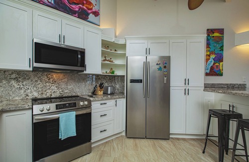 Teagues Bay Condo | East End Villa Located on Golf Course - Hilltop Pool - Pickleball - Tennis