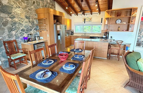Estate Chocolate Hole and Great Cruz Bay Villa | Experience the enchanting allure of La Collina – a stunning home that boasts breathtaking sunset views & ocean views, a refreshing pool, and air conditioning. Elevate your lifestyle in this picturesque retreat!