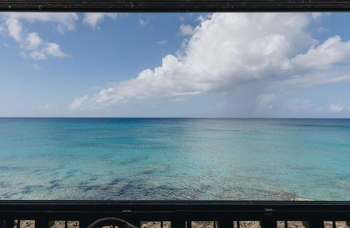 Frederiksted Condo | Fall Asleep to Waves Crashing on the Beach after watching the sunset