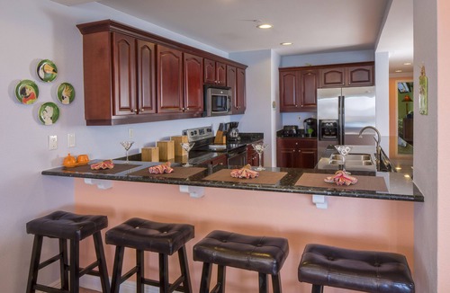 Estate Enighed Condo | Grande Bay Condo Beautiful Morning- 3 Bedroom - Wraparound Balcony- Views!