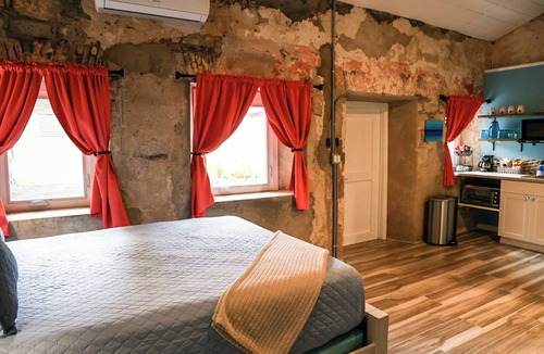 Frederiksted Southeast Hotel | Ground floor unit With local artist mural on exterior!