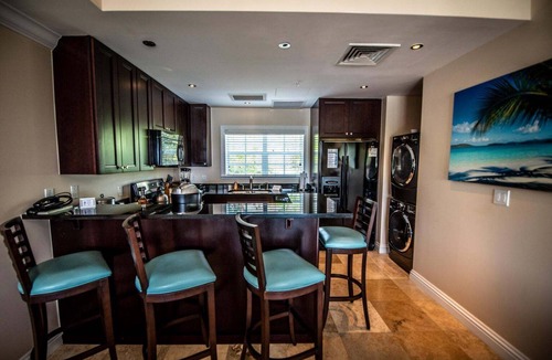 Great Cruz Bay Condo | Happy Does- 1 BR Grande Bay Unit with Stunning Views of Cruz Bay! Walk to town!