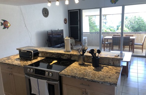 Estate Golden Rock Condo | Large Private Sun Deck With Ocean Views