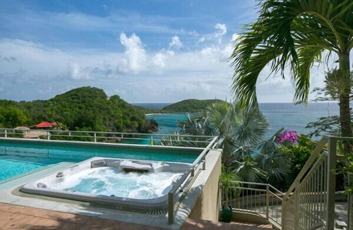Rendezvous & Ditleff Villa | Latitude 15A: Walk to Klein Bay! Pool & Hot Tub!