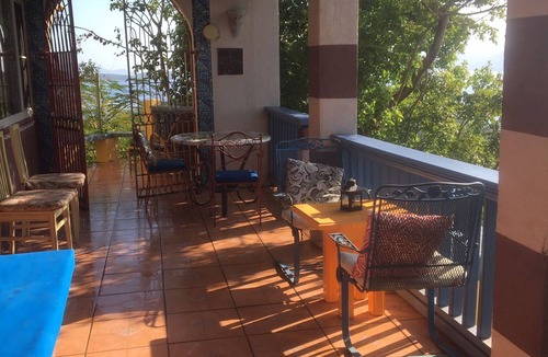 Red Hook Apartment | Lion's Gate Getaway- Lush Setting. Check for seasonal discounts