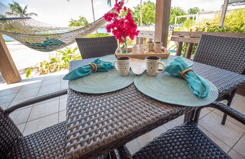 Red Hook Condo | Luxurious Beachfront Condo: May- August Savings! Paradise at your toes!