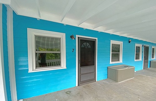 Cane Bay Cottage | Minutes Walk to Cane Bay Beach- Porch Mountain Views, Sea from the backyard