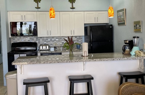 Estate Golden Rock Condo | Modern 1 bed 1 bath beachfront condo with breathtaking views 5 minutes from town