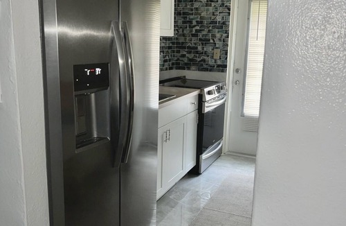 Estate Green Cay Condo | Noble Retreat, Cozy studio condo with pool, laundromat, free parking & Wi-Fi