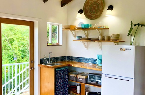Estate Emmaus Cottage | "Ocean" One bedroom cottage in the Garden of Eden Cottage Collection