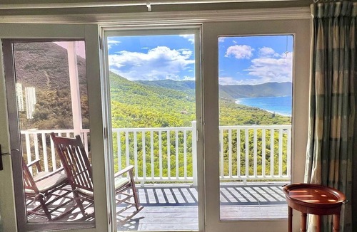 Estate Kingshill Villa | Quiet hillside villa with expansive sea, beach, and mountain views.