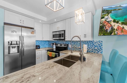 Cabes Point Apartment | Sapphire Dreams: Premier Beachfront Elegance in Building A of The Sapphire Beach Resort