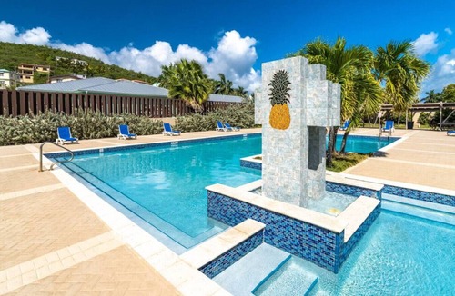 Frydendal Condo | Spacious 3BR Condo - walk to Coki Beach! Restaurant on-site!