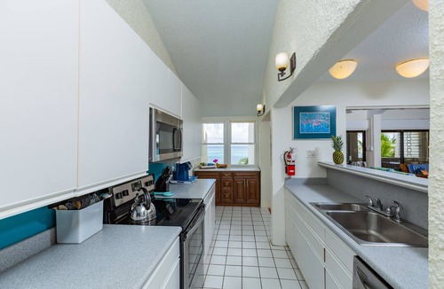 Orange Grove Condo | Spacious beach front living with spectacular Caribbean sea-views.