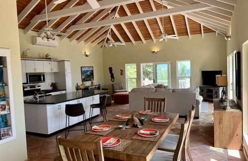 Estate Concordia East House | Sunflower - Amazing view of the Caribbean Sea, pool & lush tropical landscaping