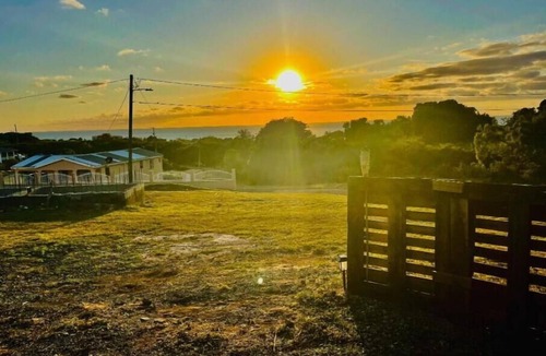 Frederiksted Southeast RV Rental | Sunset Villas"Tecoma Stans" Glamping Tent Walking Distance to the Beach
