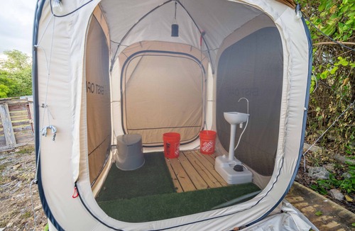Frederiksted Southeast RV Rental | Sunset Villas"Tecoma Stans" Glamping Tent Walking Distance to the Beach
