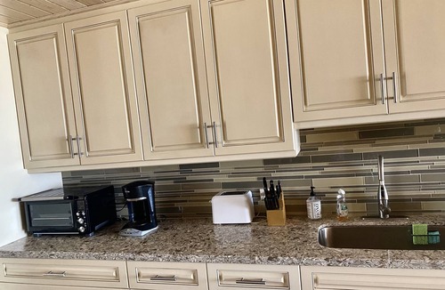 Estate Sion Farm Condo | THE BEST OF GENTLE WINDS. Luxurious unit overlooking the beach.