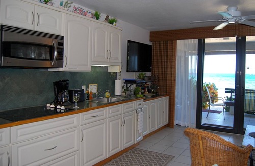Red Hook Condo | "THREE PALMS"~ Directly ON beach, remodeled, private patio, pool, quiet & clean