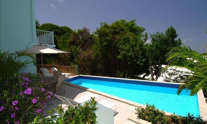 Estate Enighed Condo | Bougainvillea at Palm Terrace
