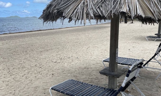 Estate Golden Rock Condo | Modern 1 bed 1 bath beachfront condo with breathtaking views 5 minutes from town