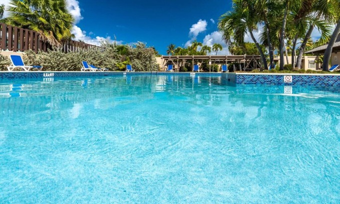 Frydendal Condo | Spacious 3BR Condo - walk to Coki Beach! Restaurant on-site!