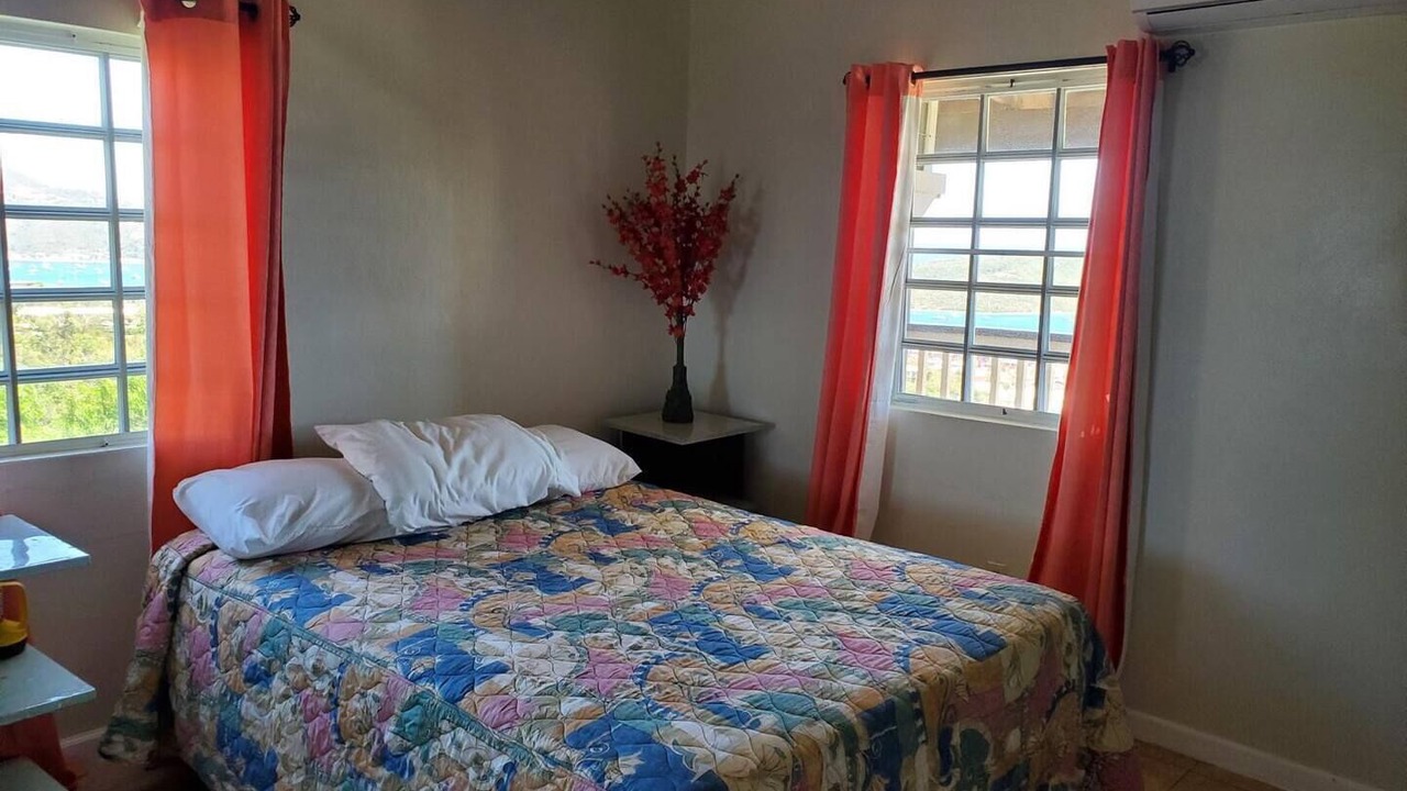 Photo of Bedroom in Estate Lower John Dunko