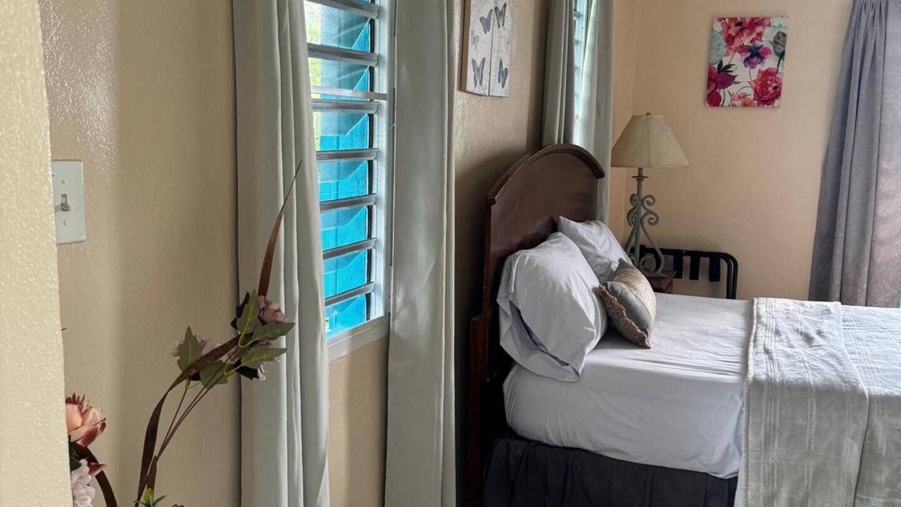 Photo of Bedroom in Estate Lower John Dunko