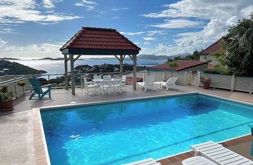 Estate Enighed Condo | Charming Condo with Breathtaking Ocean Views, Stunning Sunsets, and a Touch of Romance!