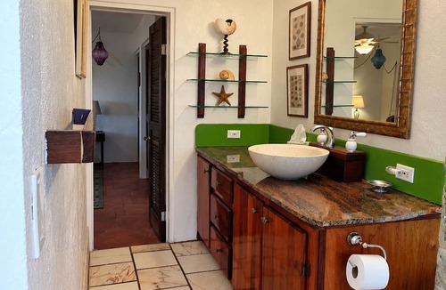Red Hook Apartment | Lion's Gate Getaway- Lush Setting. Check for seasonal discounts